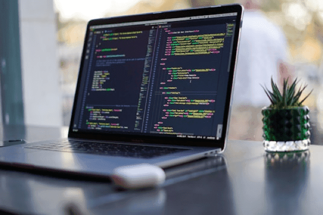 Laptop with code on screen